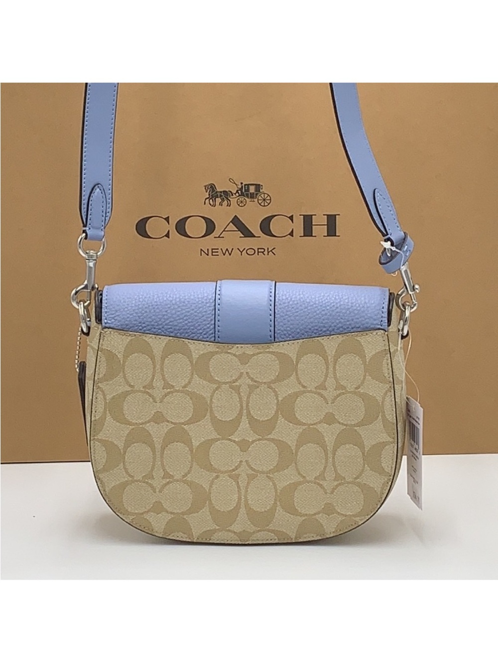 COACH Georgie Saddle Bag In Signat Canvas COLOR:
Silver/Light Khaki/Marble
Blue - Picture 4 of 16